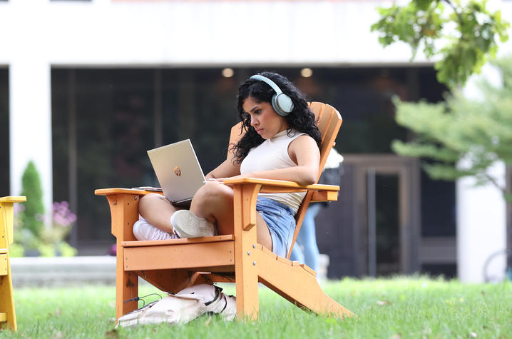 Student studying on campus.