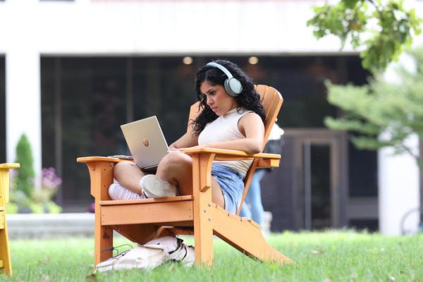 Student studying on campus.