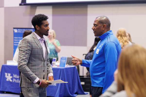 2 black males in conversation