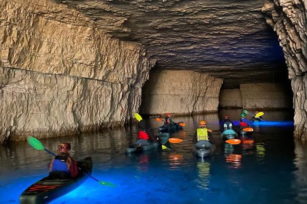 Photo of cave kayaking participants inside the cave on a guided 1 hour tour with Gorge Underground