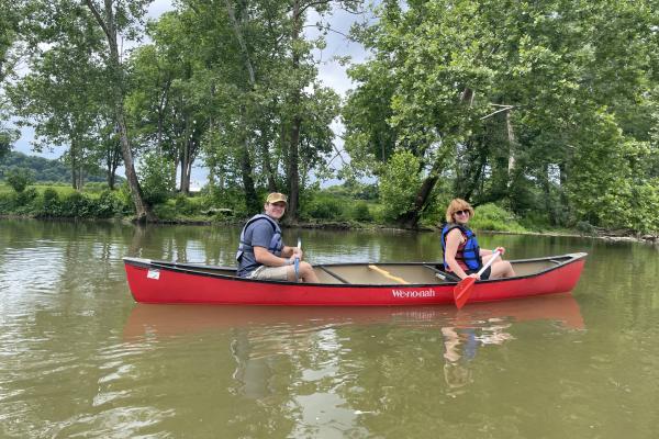 Two students canoeing on the Elkhorn river