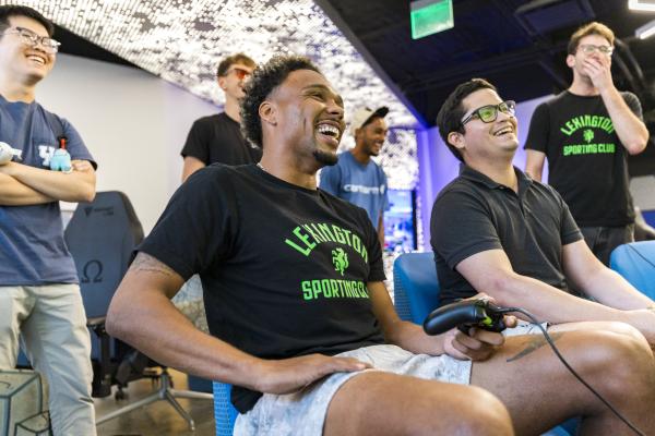 Players in the Esports Lounge at UK playing in a tournament.