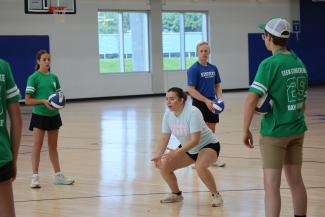 IM staff demonstrating volleyball