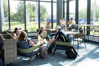 Students gathering in a common space to study.