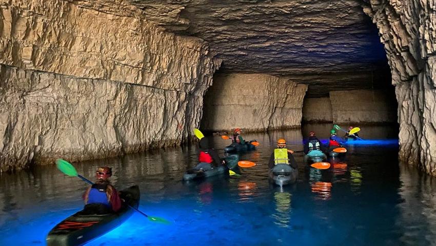Photo of cave kayaking participants inside the cave on a guided 1 hour tour with Gorge Underground