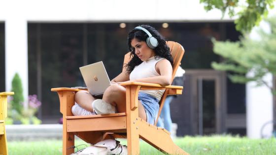 Student studying on campus.