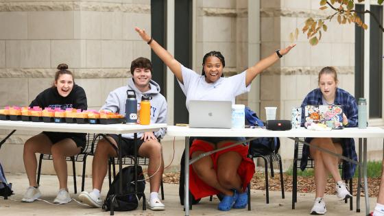 Residence Life staff welcoming students to campus during fall move in