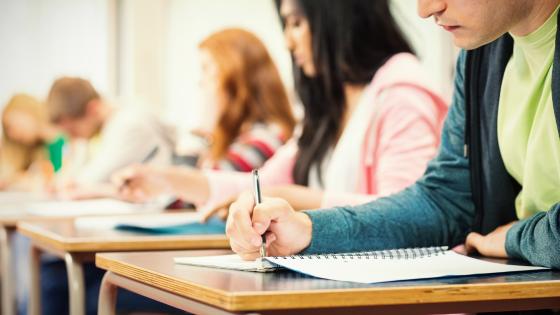 Students in college classroom.