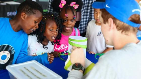 UK Student doing activity with children
