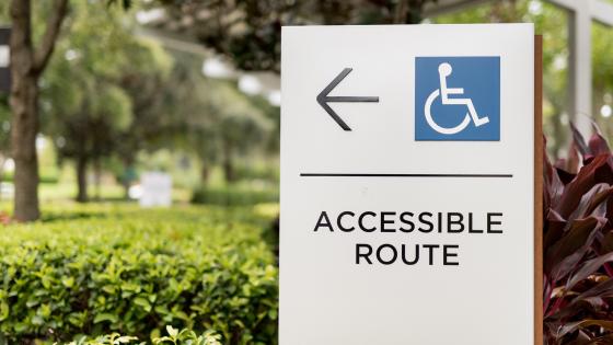 Accessible route sign post.