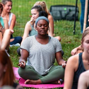 students doing yoga