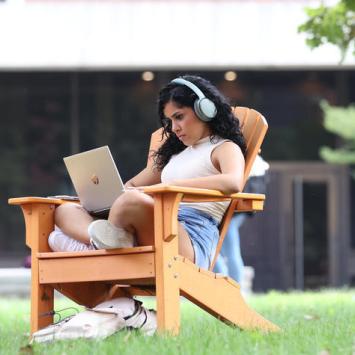 Student studying on campus.