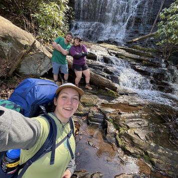 Leah's selfie with friends in front of a waterfall